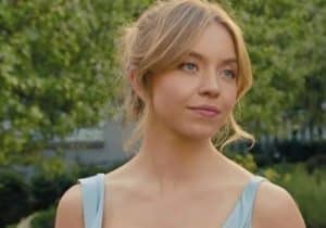 Sydney Sweeney Smiles In Candid Topless Photo